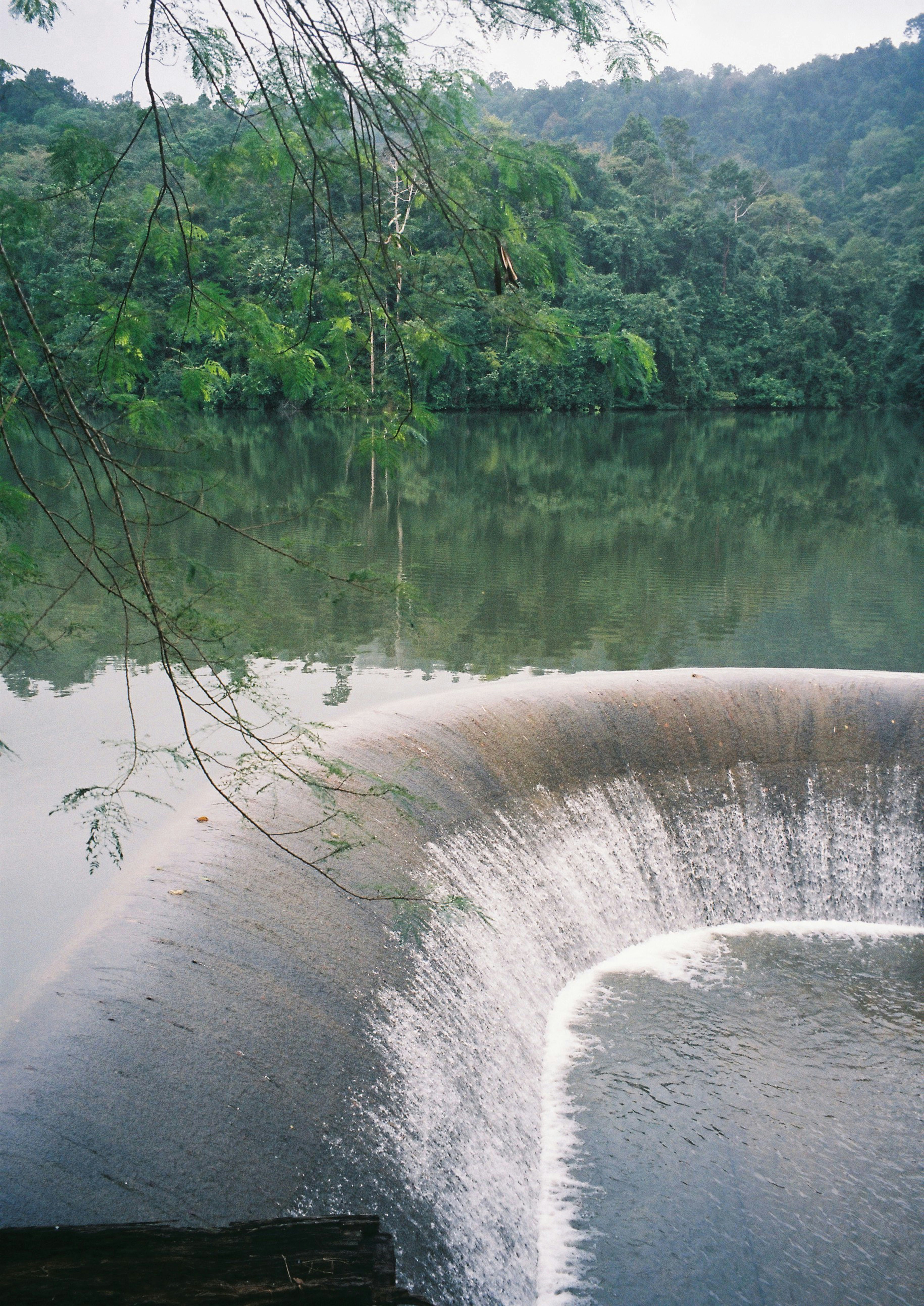 a large pipe in the middle of a body of water