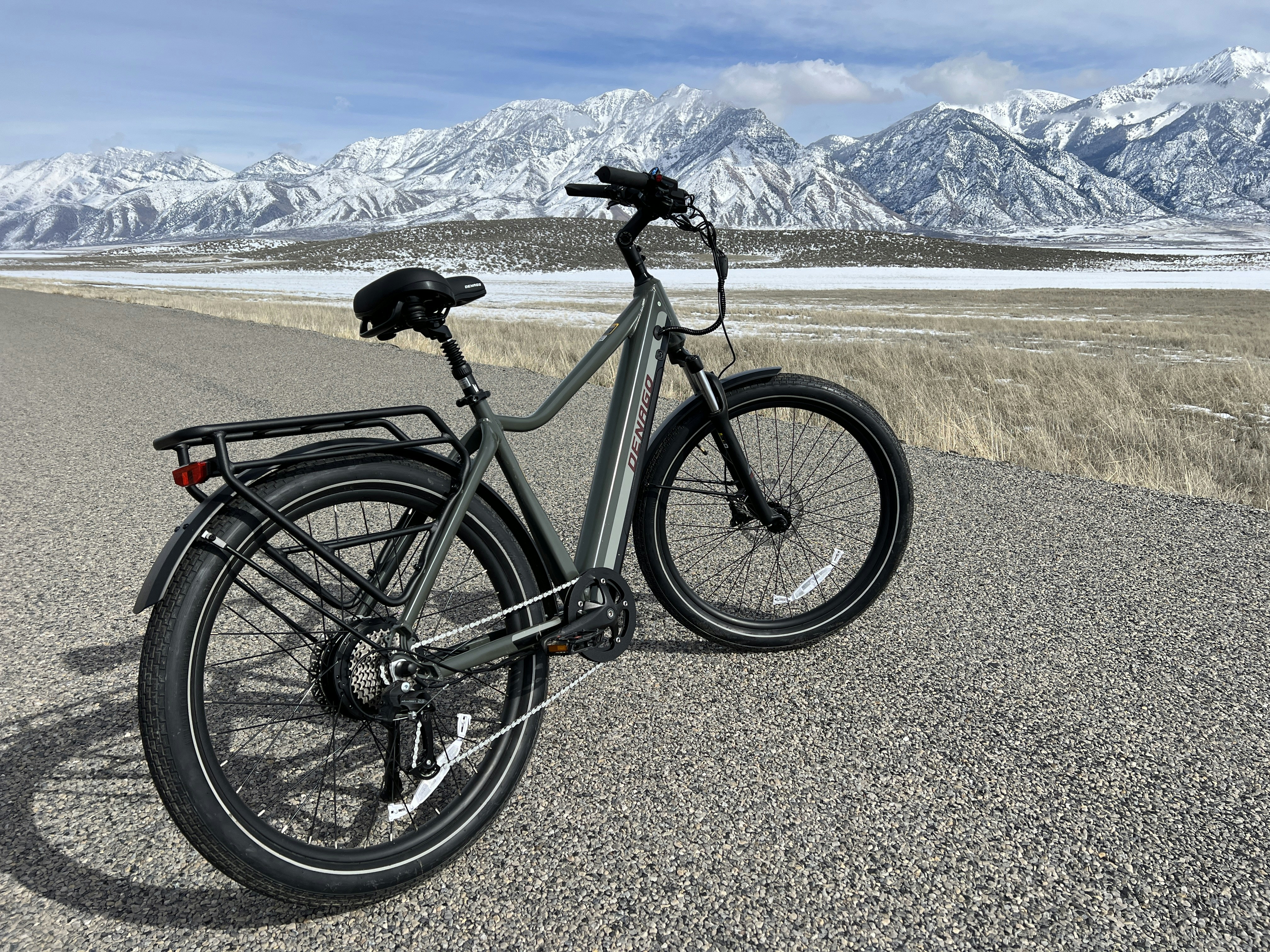 a bicycle parked on the side of a road
