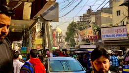 A busy street scene near s s enterprises in Thulendi, capturing daily life.