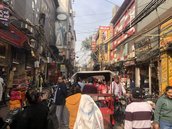 A vibrant street scene capturing daily life in an Urdu-speaking community.