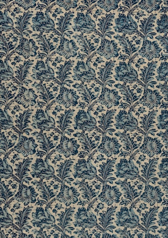 a blue and white wallpaper with a pattern of leaves