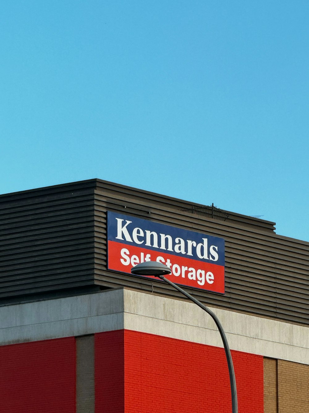 a store sign on top of a building