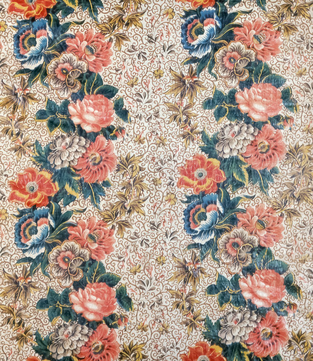 a close up of a flowery fabric with many flowers
