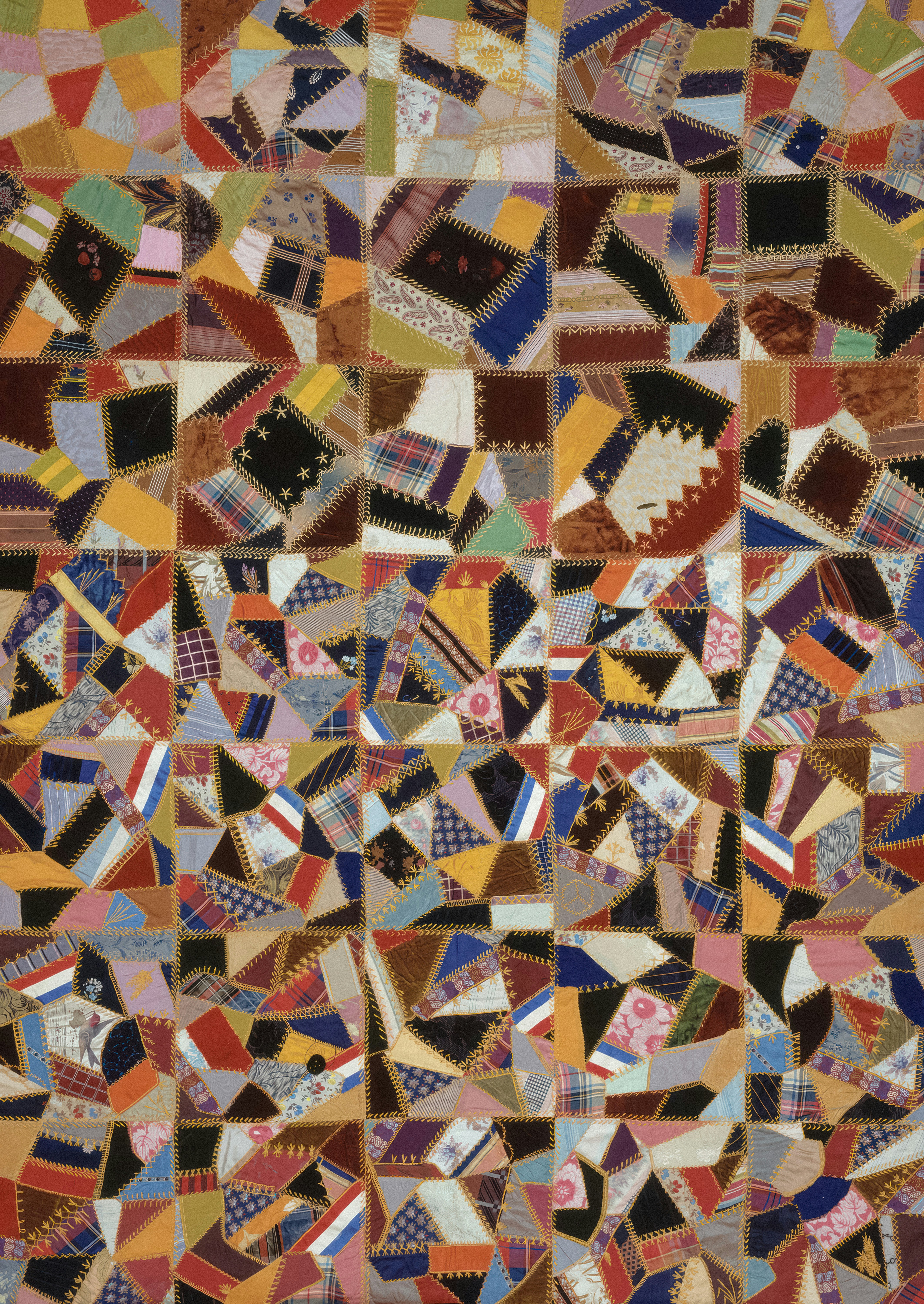 a patchwork quilt with a lot of different colors
