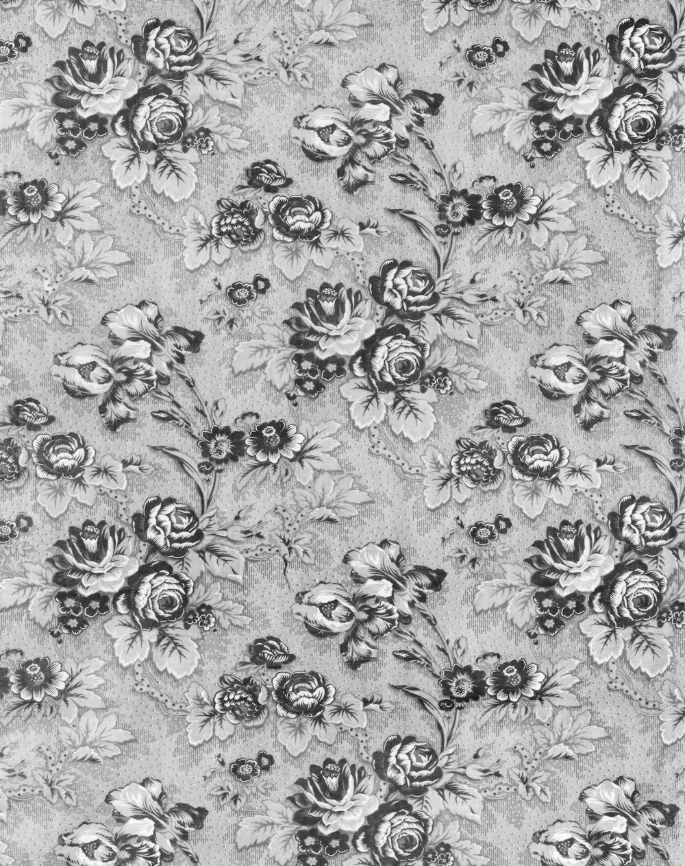 a black and white floral pattern on a gray background