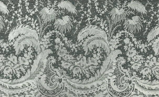 Detailed Lambini work featuring delicate thread patterns on traditional Indian textiles.
