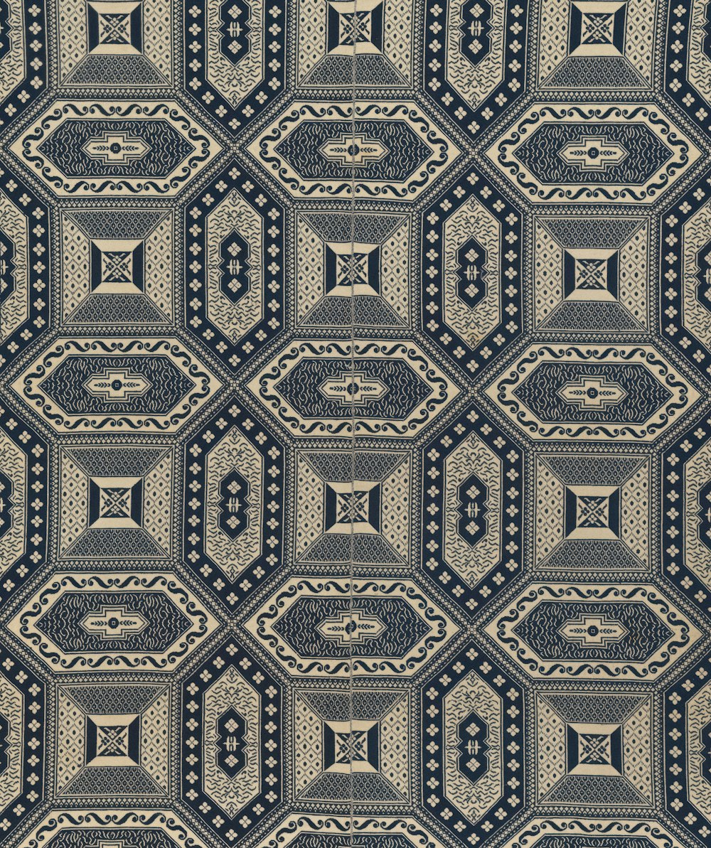 a blue and beige pattern with circles and squares