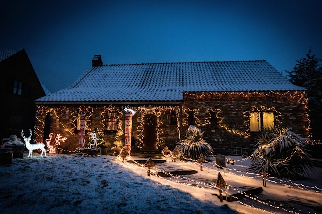 A cozy home adorned with colorful Christmas lights.