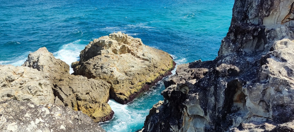 a view of the ocean from the top of a cliff