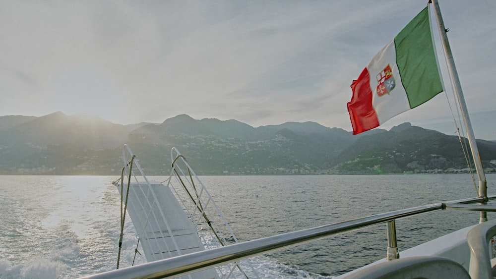 a flag on a boat in the water