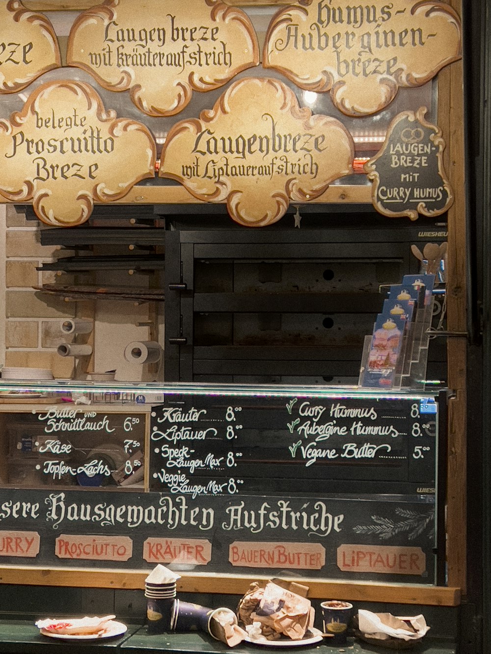 a display case with a variety of pastries on it