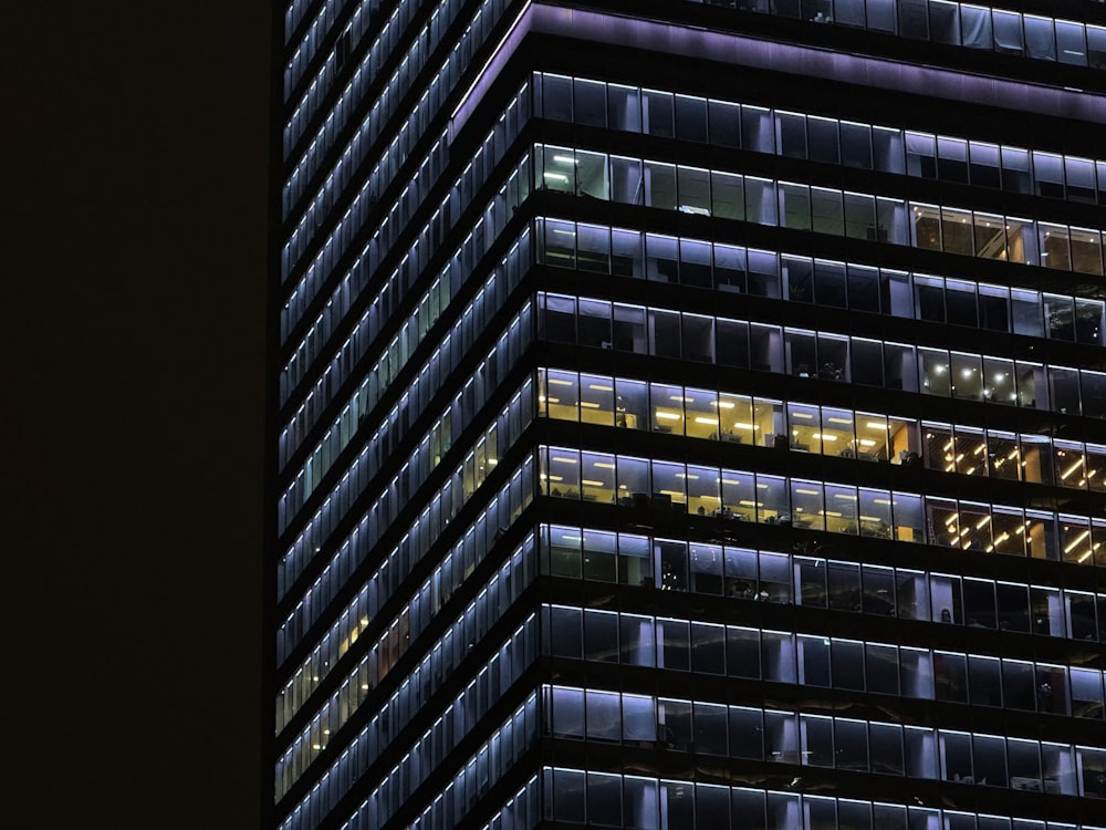 a very tall building lit up at night