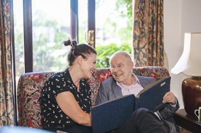 a man and a woman sitting on a couch