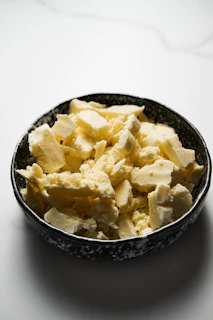 a bowl of food that is on a table