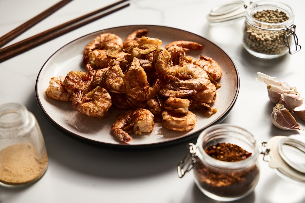 a plate of fried food on a table