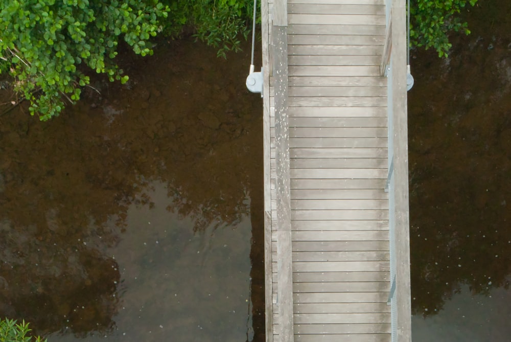 a bird's eye view of a bridge over a river