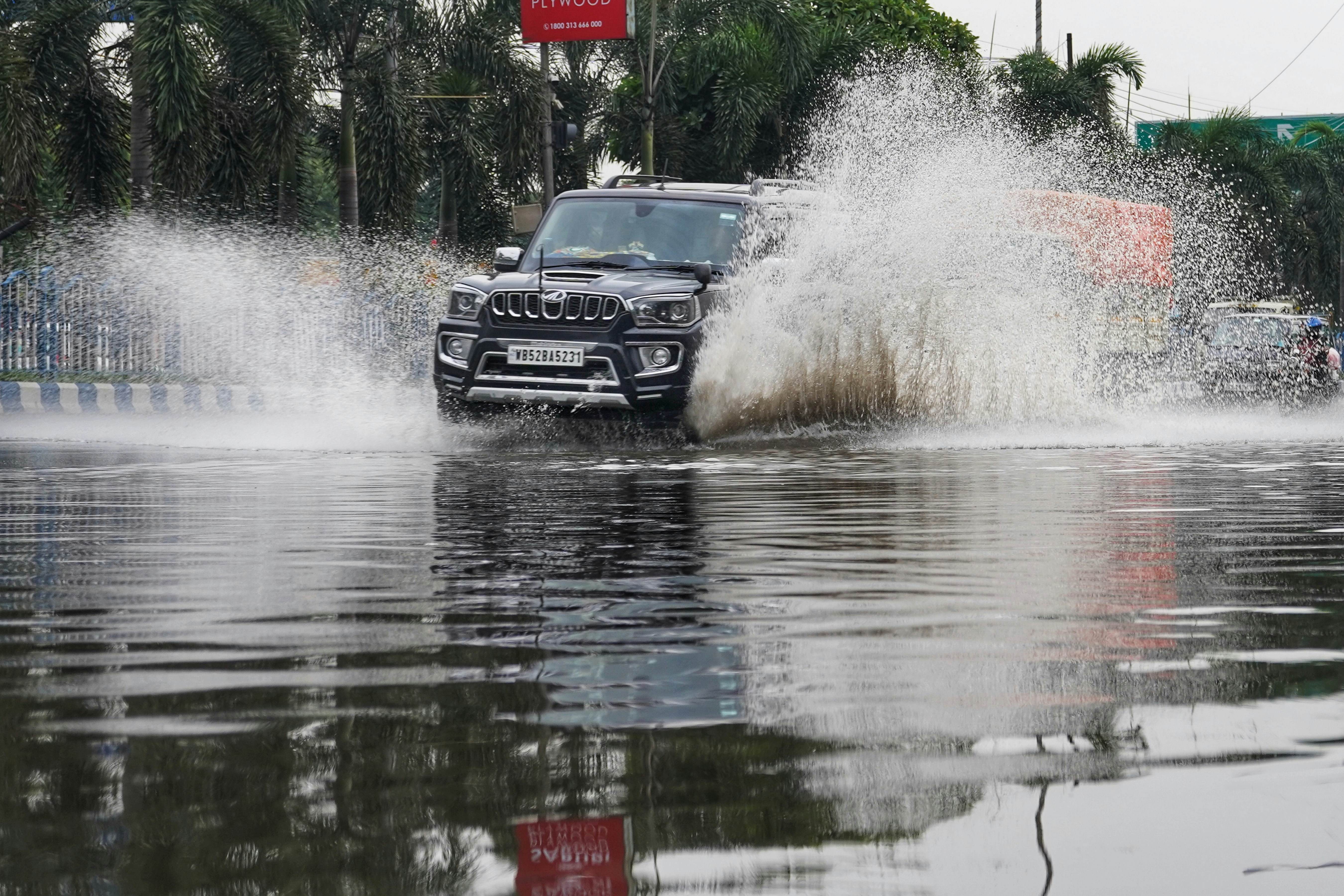 a car driving through a flooded street