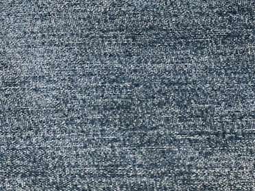 Close-up of finely woven suiting fabric in deep navy blue with subtle texture.