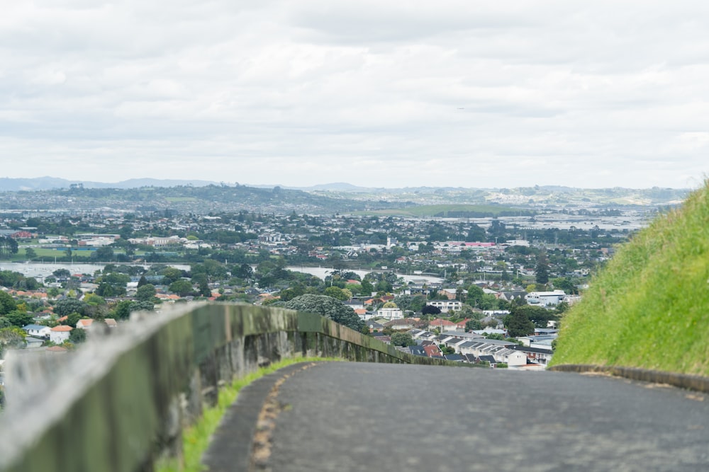 a view of a city from the top of a hill