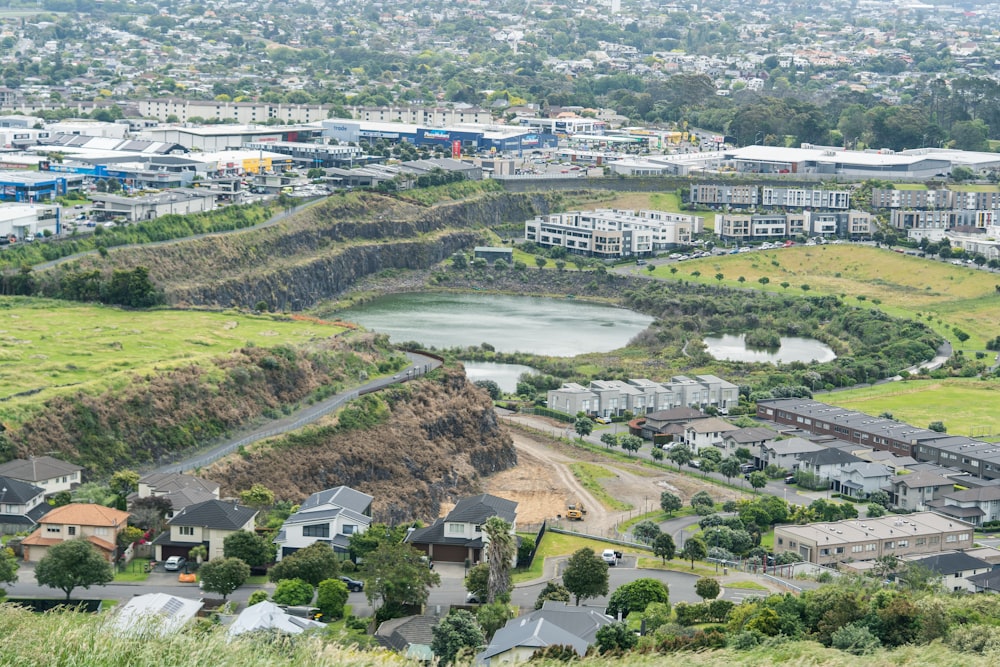 an aerial view of a city with lots of houses