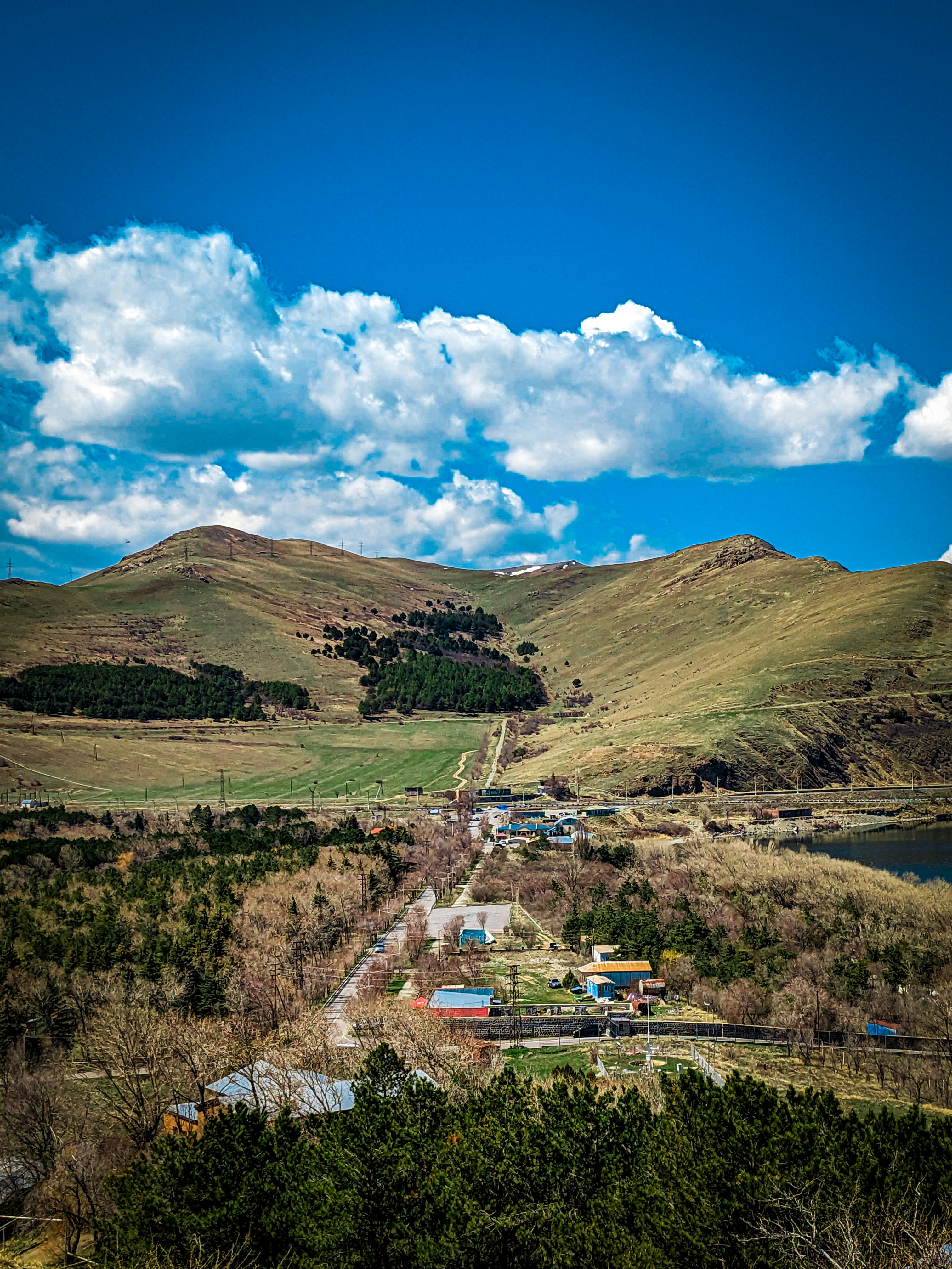 A scenic view of a small town in the mountains
