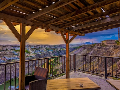 Beautiful wooden terrace extending from a cozy home.