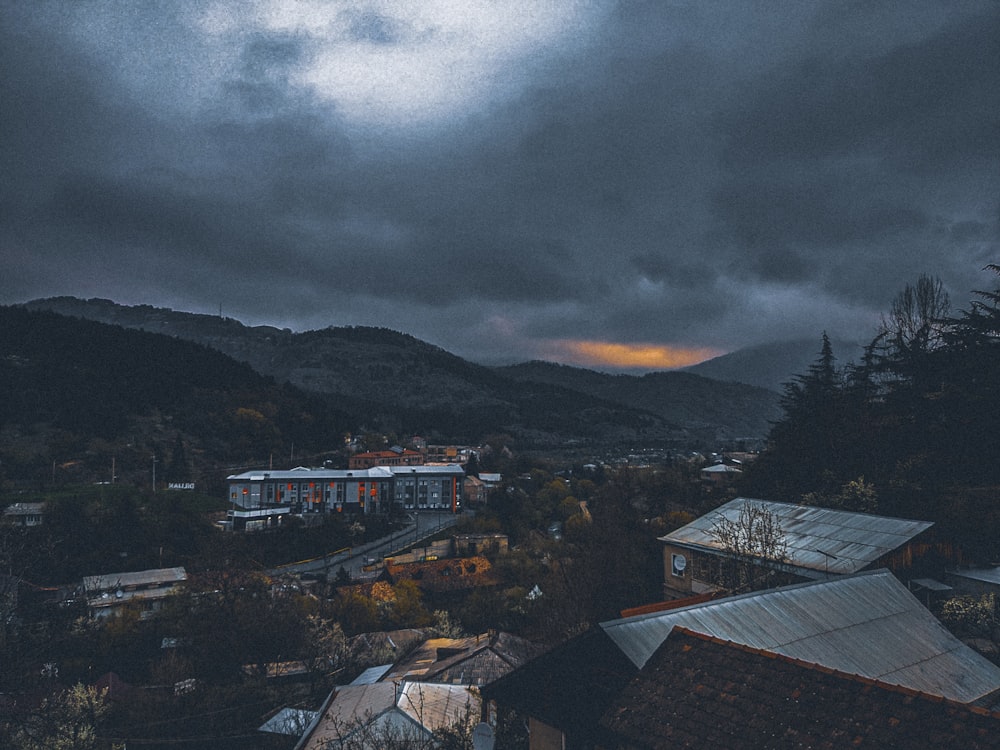 a view of a city with mountains in the background