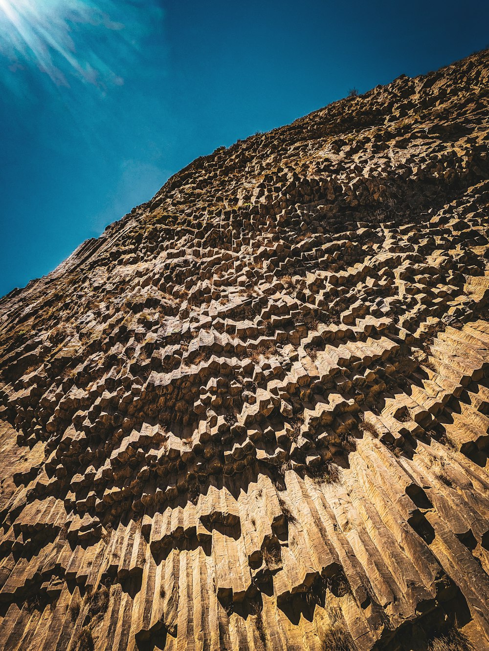 a view of the top of a building made of rocks