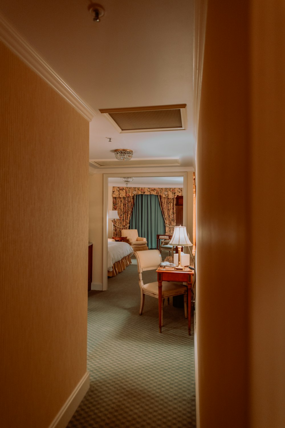 a view of a hotel room through a doorway
