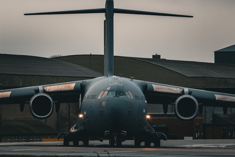 a large jetliner sitting on top of an airport tarmac