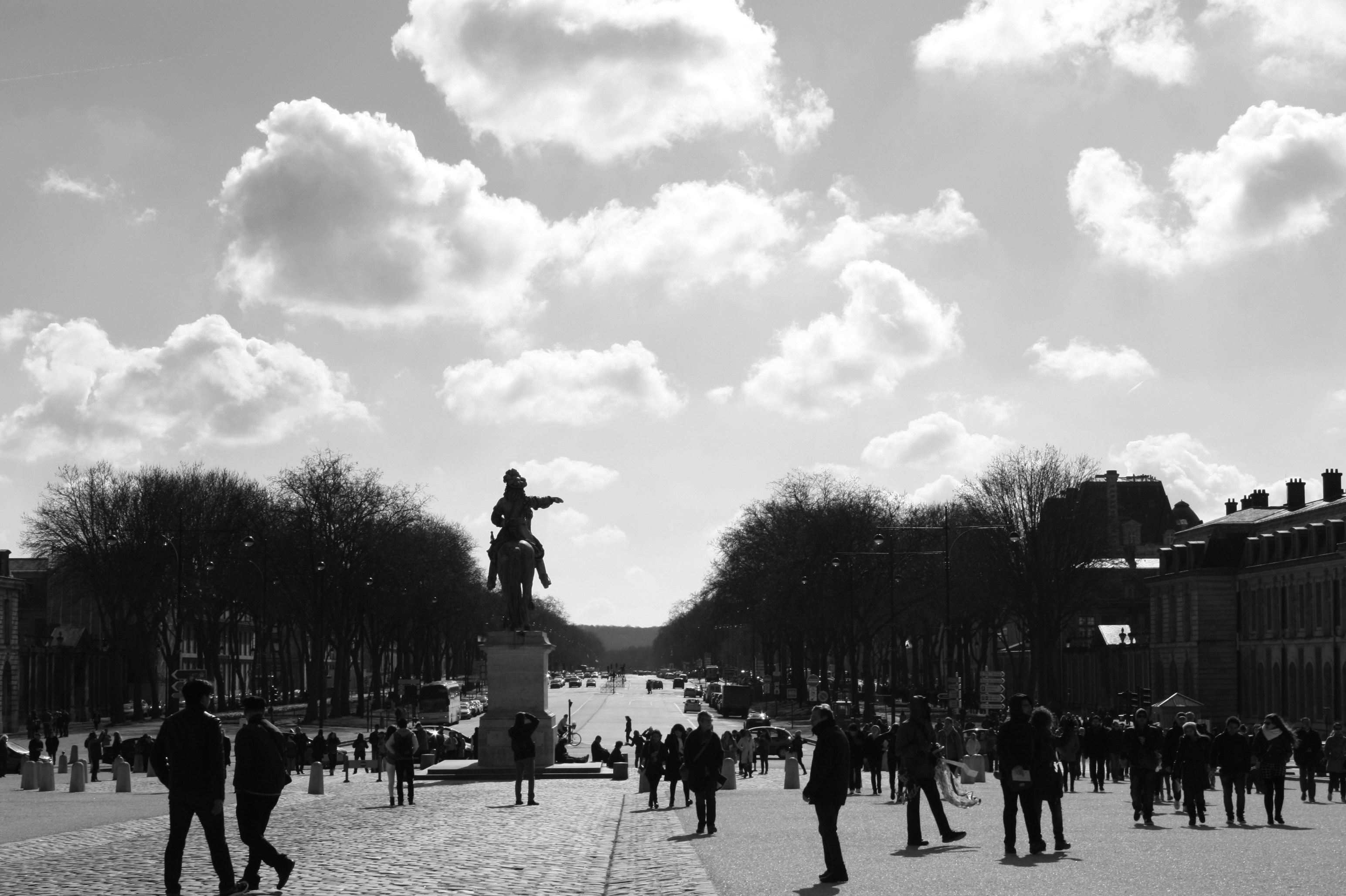 a black and white photo of a crowd of people