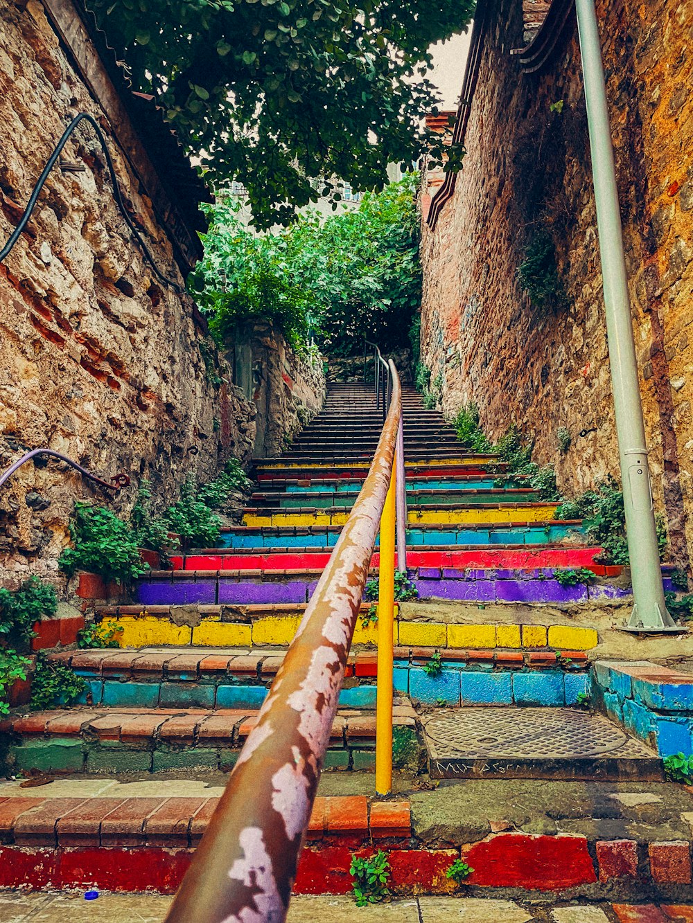 a set of stairs painted in different colors