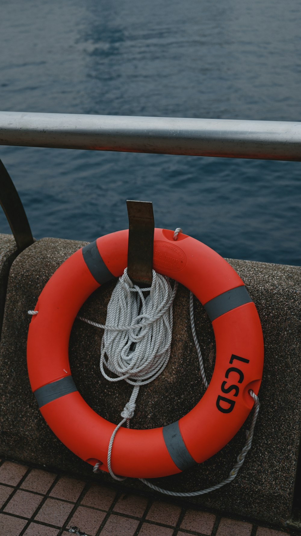 a life preserver sitting on the side of a boat