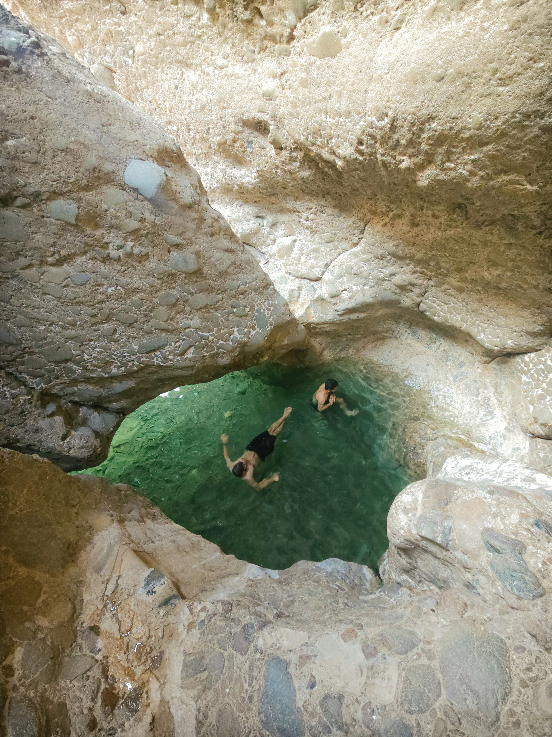 woman wearing yellow long-sleeved dress under white clouds and blue sky during daytime