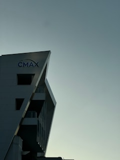 Wide shot of the Credimax Solutions office building with company branding