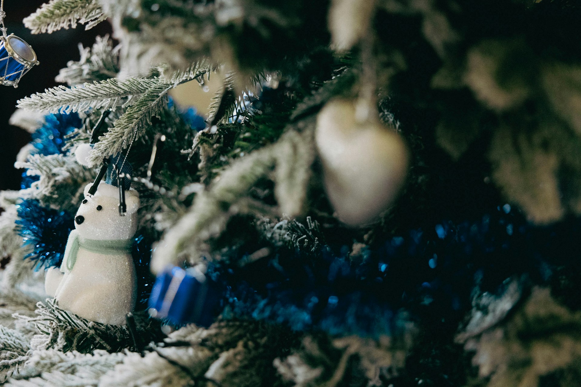 a close up of a christmas tree with ornaments