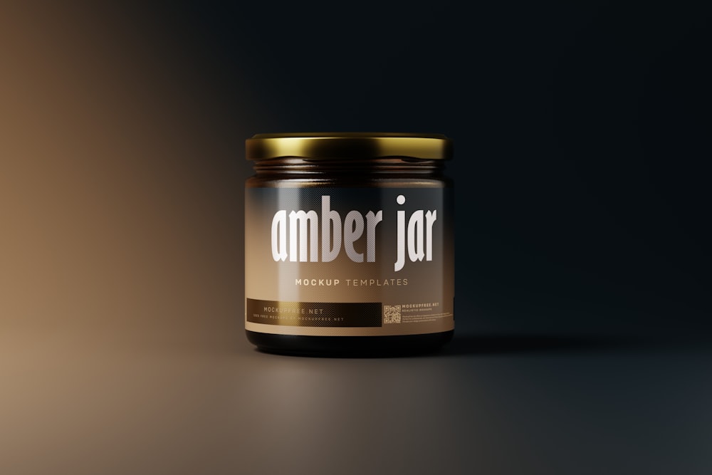 a jar of amber jam sitting on a table