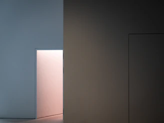 A finished doorway installation showcasing smooth edges and a perfect fit, bathed in soft blue-toned lighting.