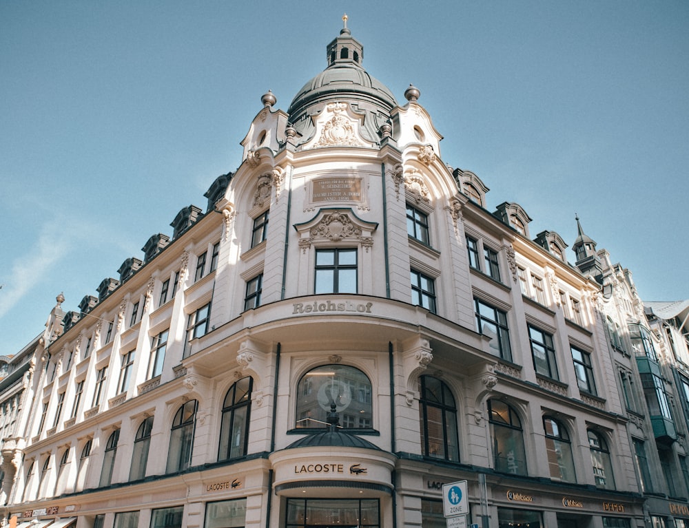 a tall building with a clock on the top of it