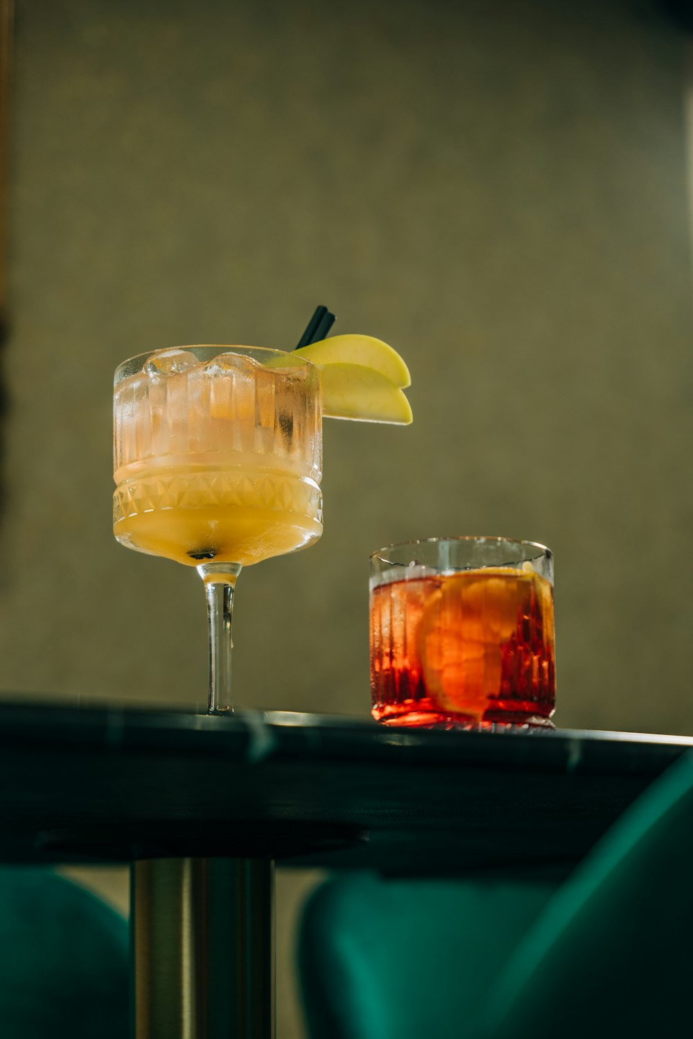 a couple of drinks sitting on top of a table