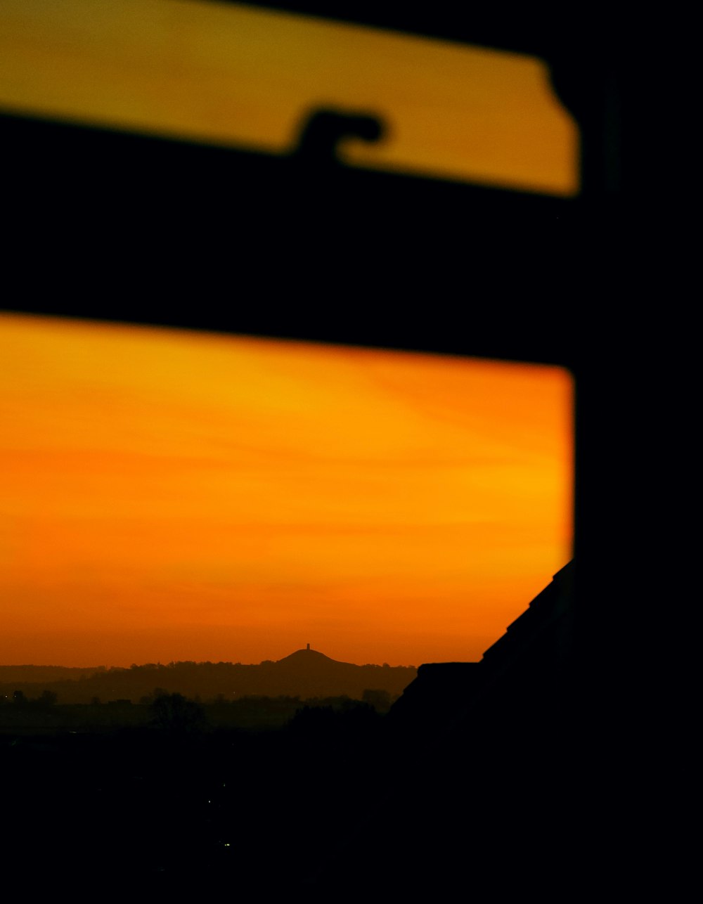 a view of a sunset through a window