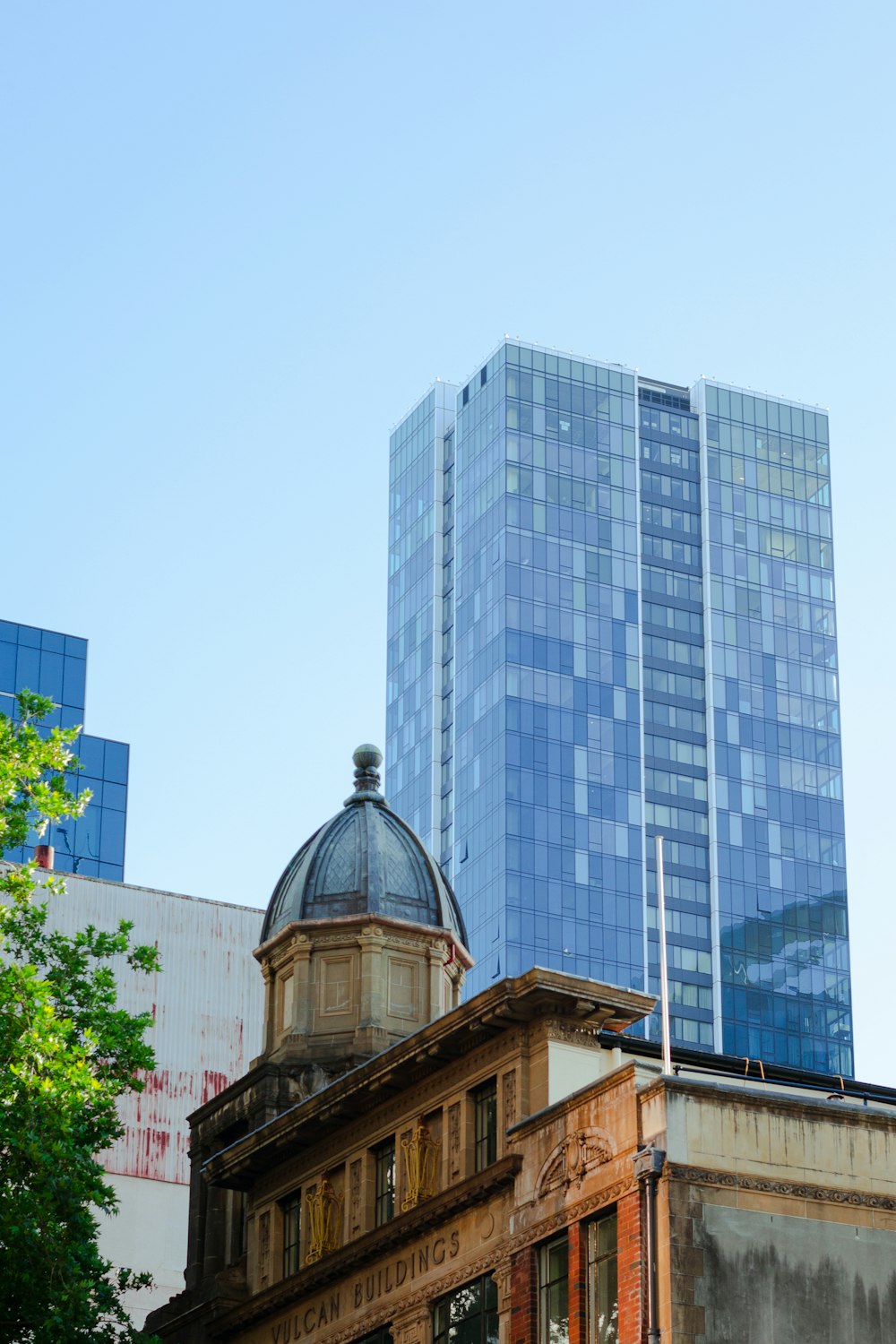 a tall building with a dome on top of it