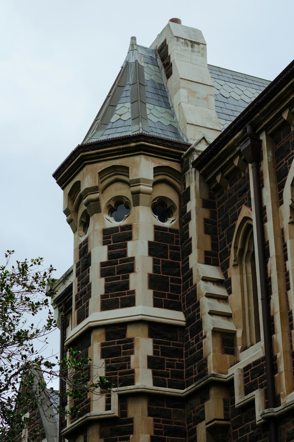 a tall building with a clock on the front of it