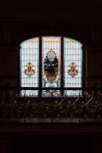 a large stained glass window in a building