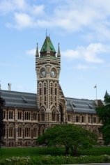 a large building with a clock on the front of it