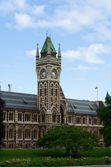 a large building with a clock on the front of it
