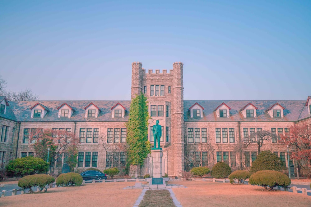 a large brick building with a clock tower