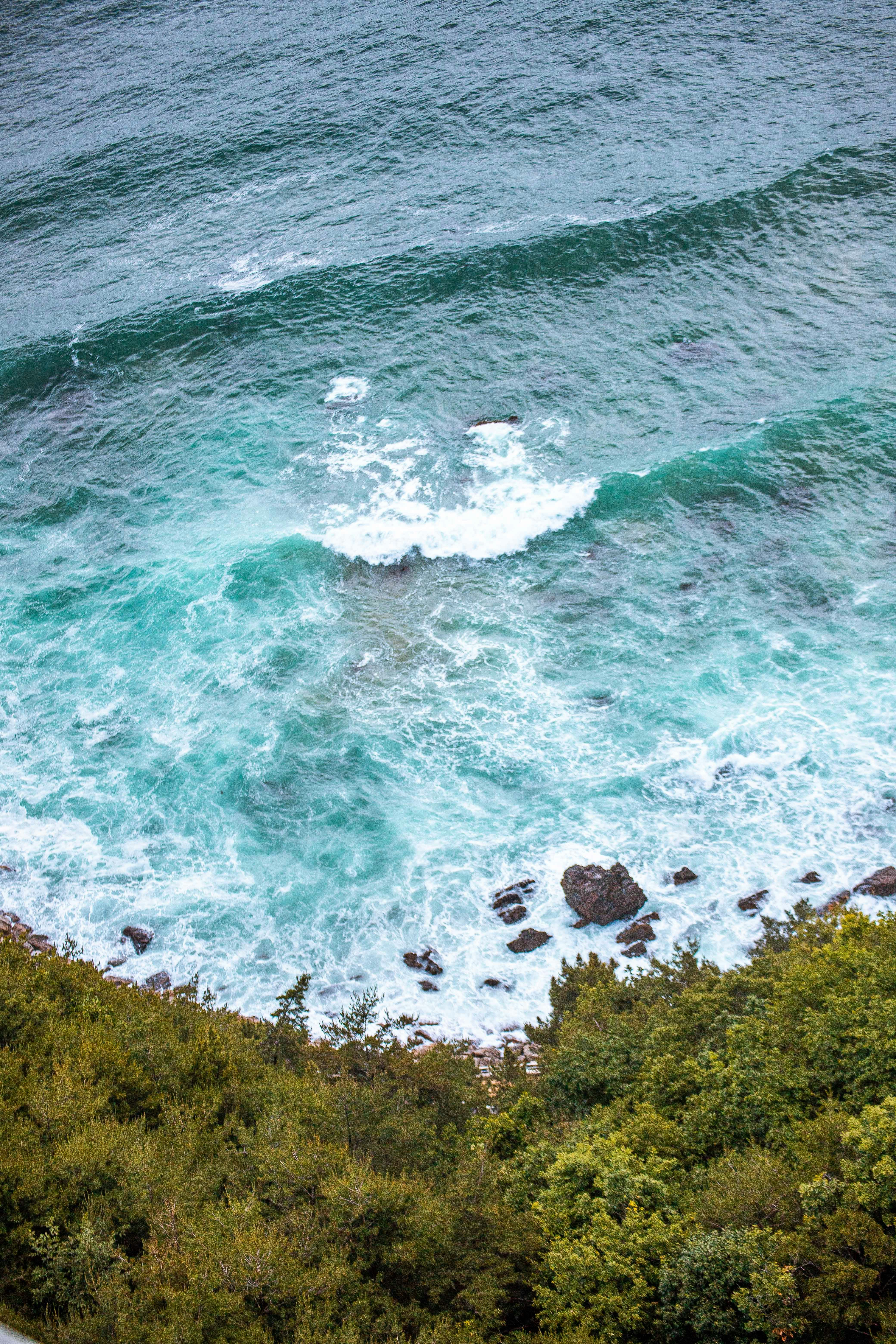 a view of a body of water from a hill