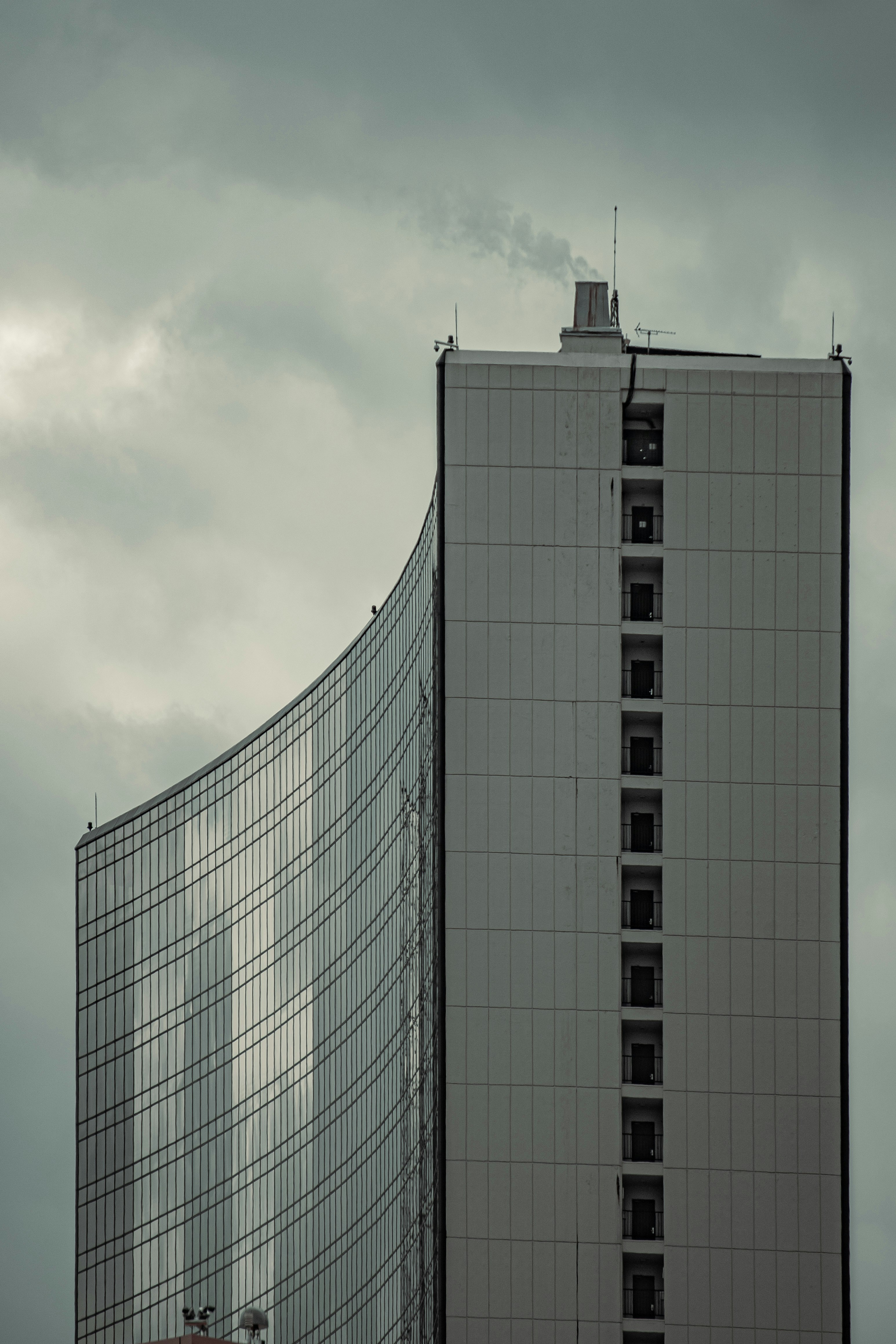 a very tall building with a clock on it's side