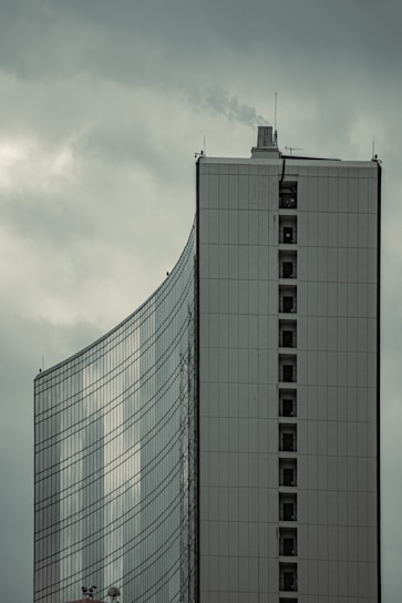 a very tall building with a clock on it's side